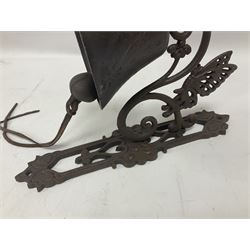 Cast iron exterior hanging garden bell with decorative butterfly bracket