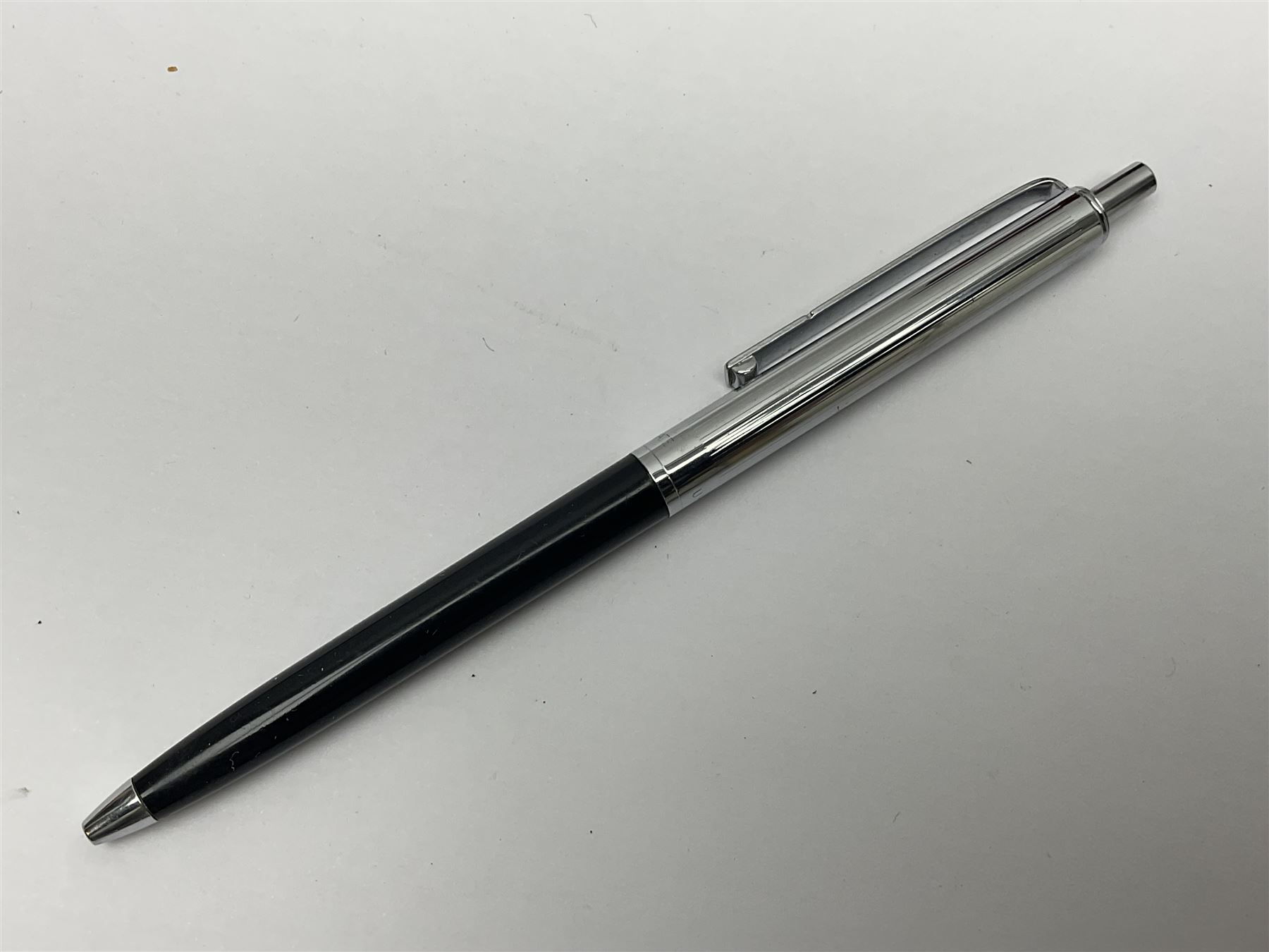 Three fountain pens, to include Conway Stewart 'Dinkie 550' and 'Conway 57' and a Parker 'Slimfold', all with 14ct gold nibs, together two roller ball pens, including a Parker example and a Swarovski Crystal paperweight