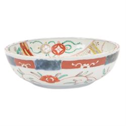 Japaneses imari bowl, decorated to the interior with a crane within a landscape, birds and insects, the external decoration of foliate scrolls, D25cm 