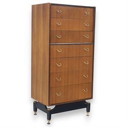 G Plan - 'Librenza' tola wood chest of seven drawers, gold coloured metal pulls on an ebon...