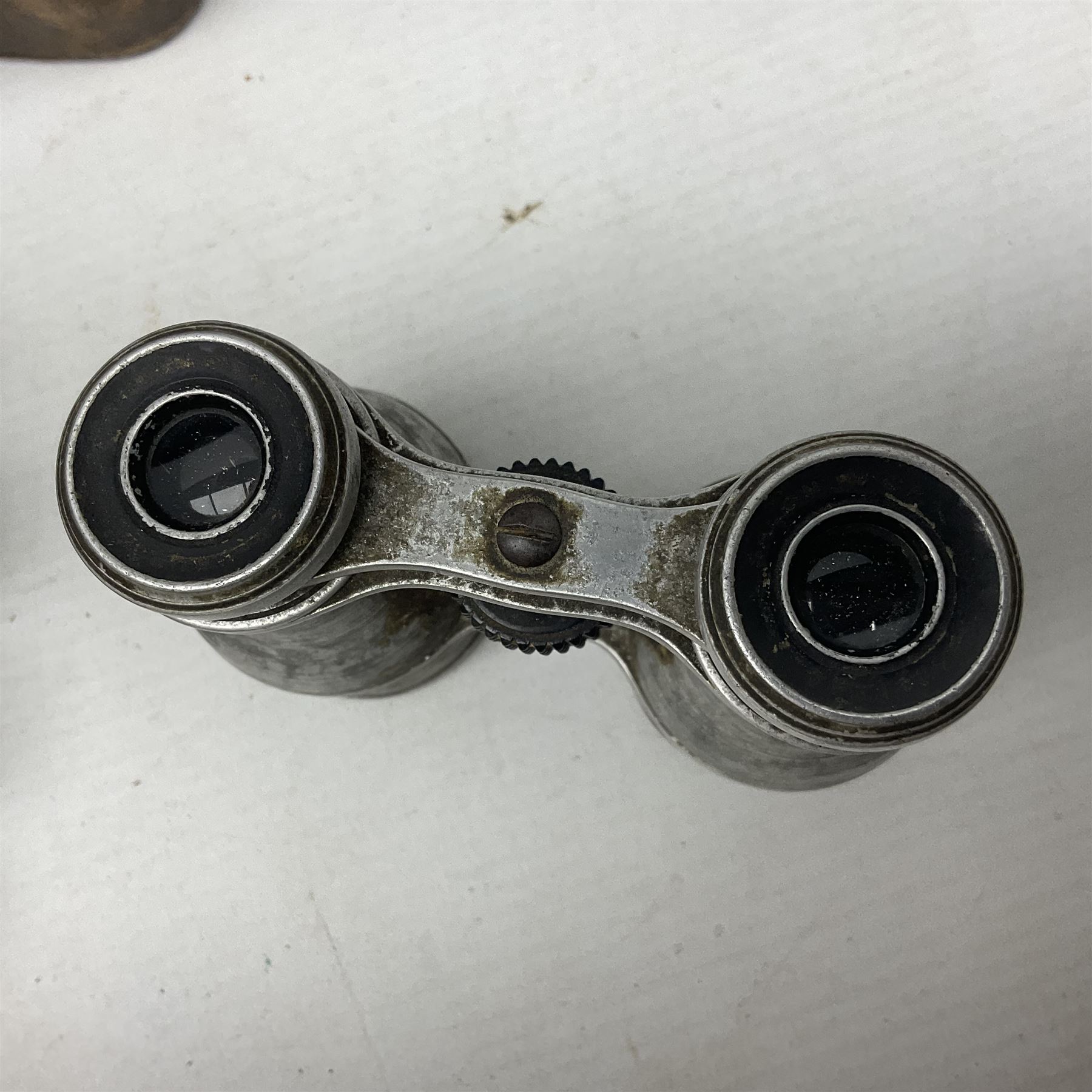 Mundial Brazil bowie knife, the 15.5cm steel blade inscribed 'Sheriff Knife', with banded and aluminium hilt; in leather sheath L29cm overall; British Army felt covered metal water bottle with webbing strap; leather 12-bore cartridge belt; and small pair of non-military binoculars in part case (4)