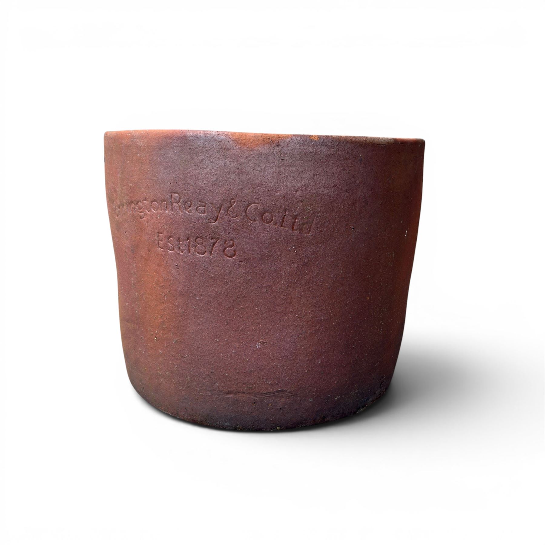 Large terracotta circular planter, oval form with ribbed top, planted; and an Errington Reay & Sons terracotta planter