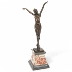 After Demétre Haralamb Chiparus (Romanian 1886-1947): Art Deco style bronze figure modelled as a dancer with raised arms, signed to the stepped bronze base and also bearing foundry stamp, upon a tapering marble plinth, overall H55cm

