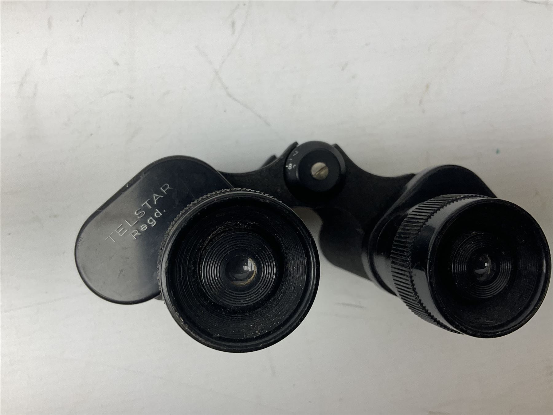 Quantity of binoculars for spares and repair, to include Cogswell & Harrison Primic 8x30, Prinz 8x30, Telstar 35x60, Zeiss Wetzland 8x40 etc