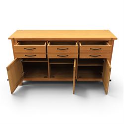 Contemporary Oak sideboard, rectangular top with tenon detailing, three drawers over three cupboard doors, blackened metal handles, raised on square supports