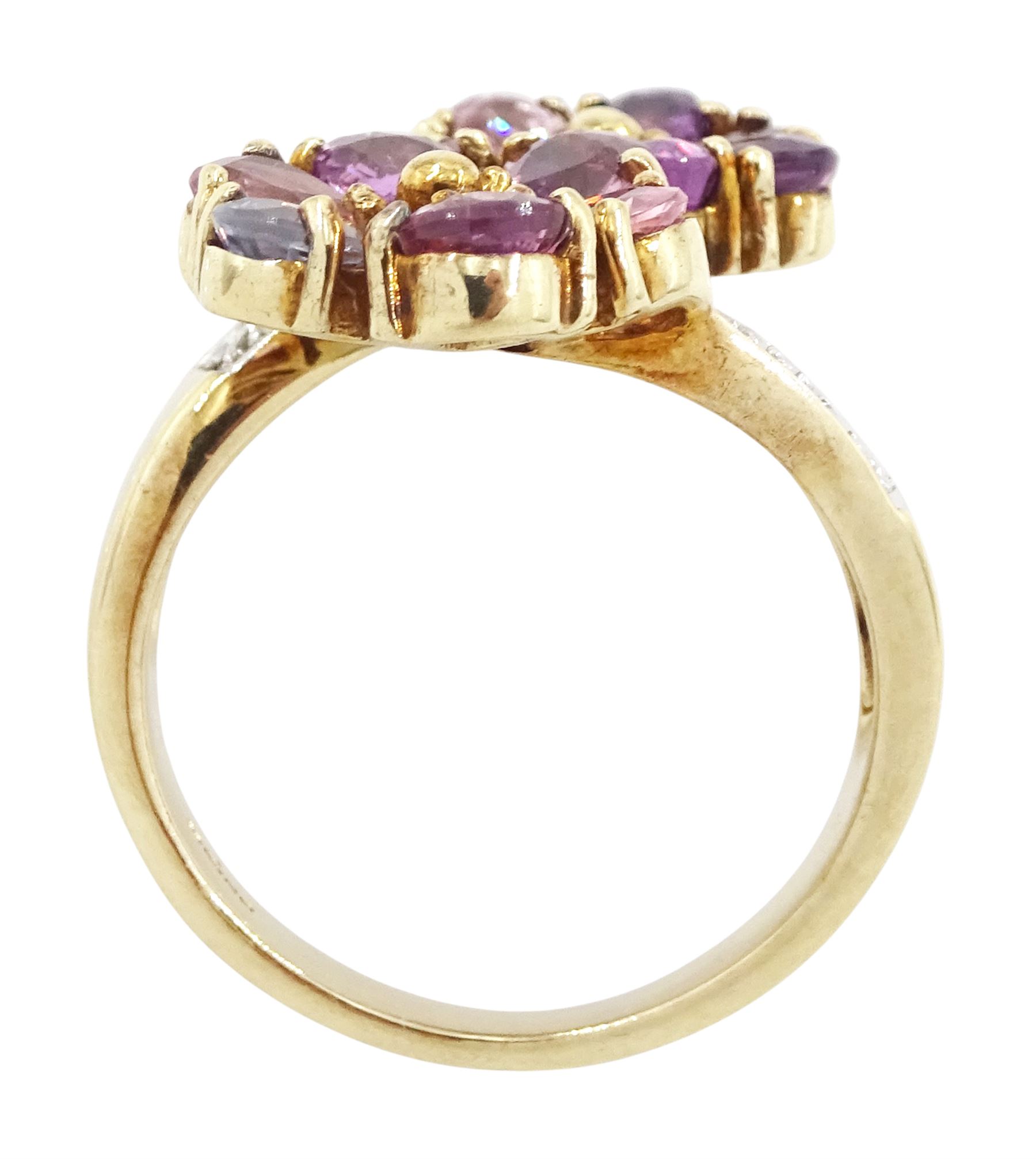 9ct gold sapphire and diamond flower head crossover ring, two flowers each set with pear cut, multi-coloured sapphires, to split diamond set shoulders, Birmingham 2006, total sapphire weight approx 3.30 carat