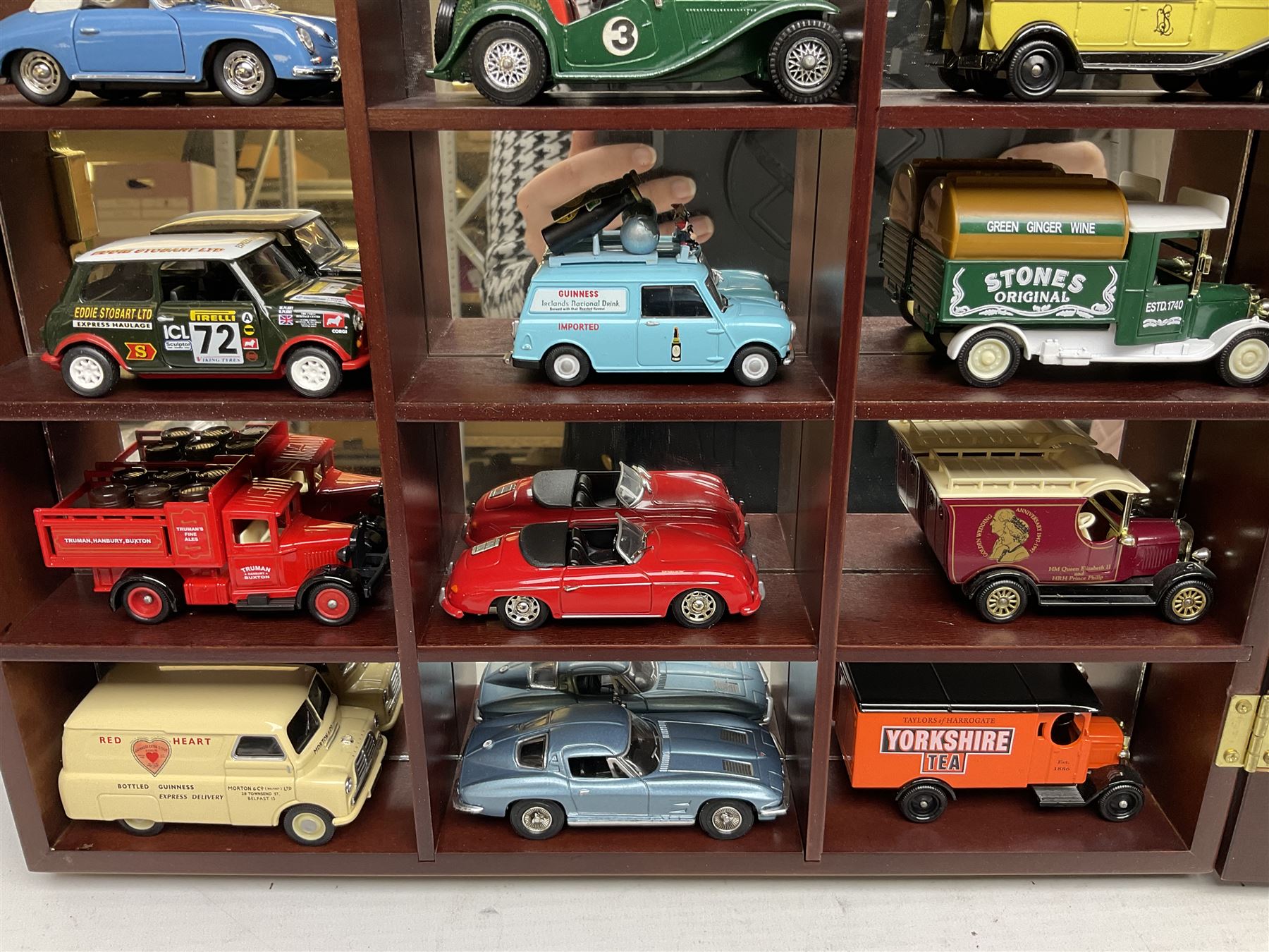 Collection of die-cast vehicles to include Corgi, Dinky, Lledo and Days Gone, housed in six wood display units