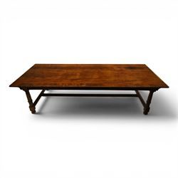 Large oak and pine farmhouse table, with pine plank top raised on and oak base with turned supports united by a long stretcher 