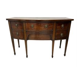 George III mahogany bow-fronted sideboard, mahogany banded top over three drawers and cupboard, fitted with lion mask and hoop handles, on square tapering supports with spade feet