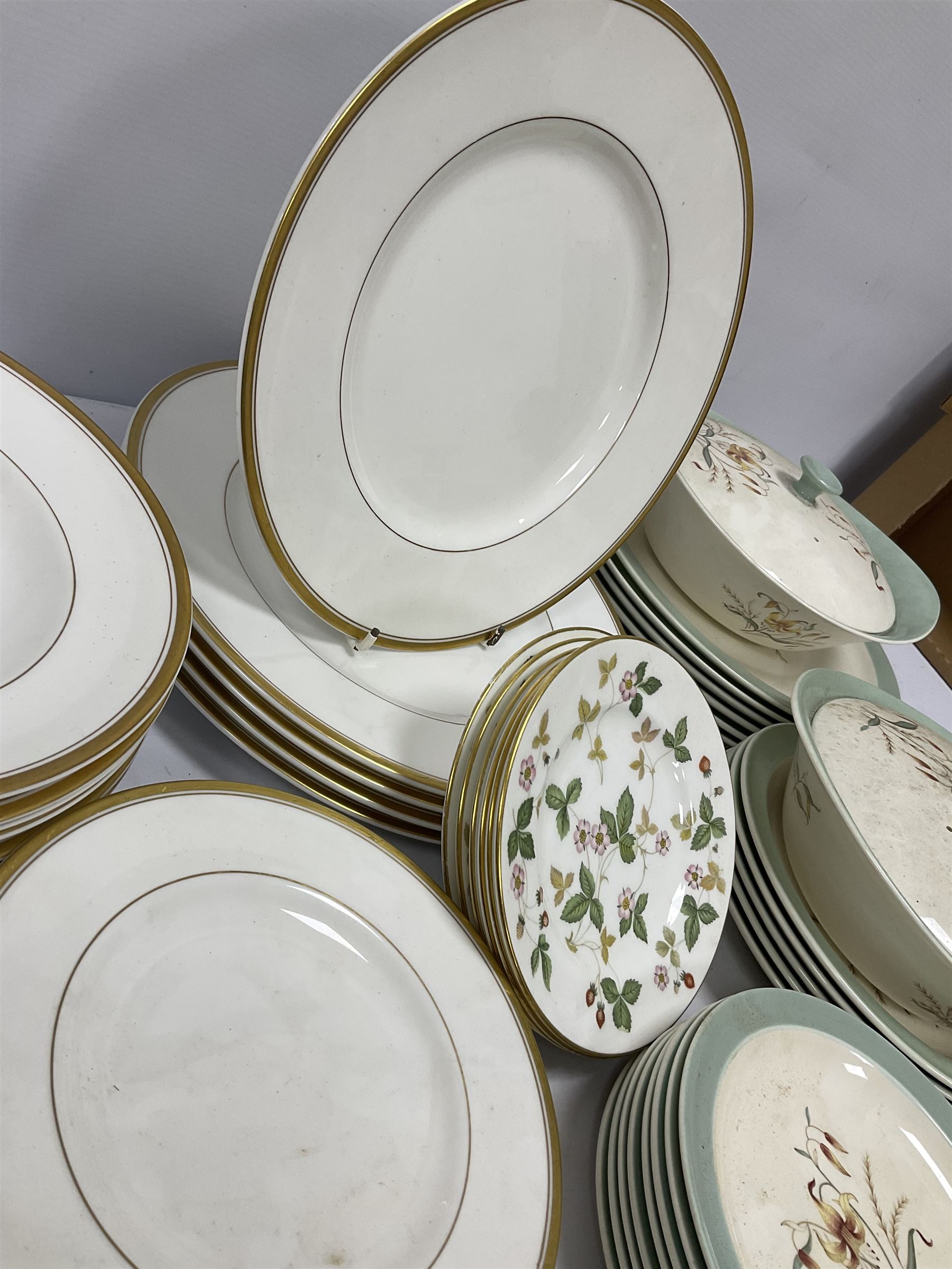 Wedgwood 'Tiger Lily' pattern dinner wares to include two lidded tureens and six dinner plates, Royal Worcester dinner plates and side plates in the 'Viceroy' pattern, Wedgwood 'Wild Strawberry' plates