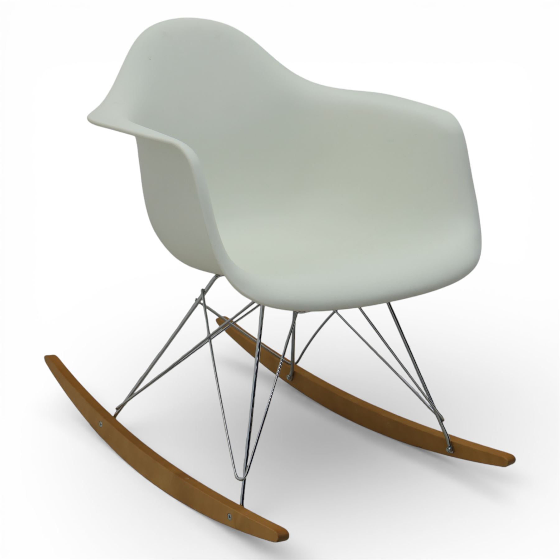 Vitra - RAR rocking chair, moulded plastic shell in cotton white with integrated arms, raised on chrome wire supports with stained wooden rocking runners