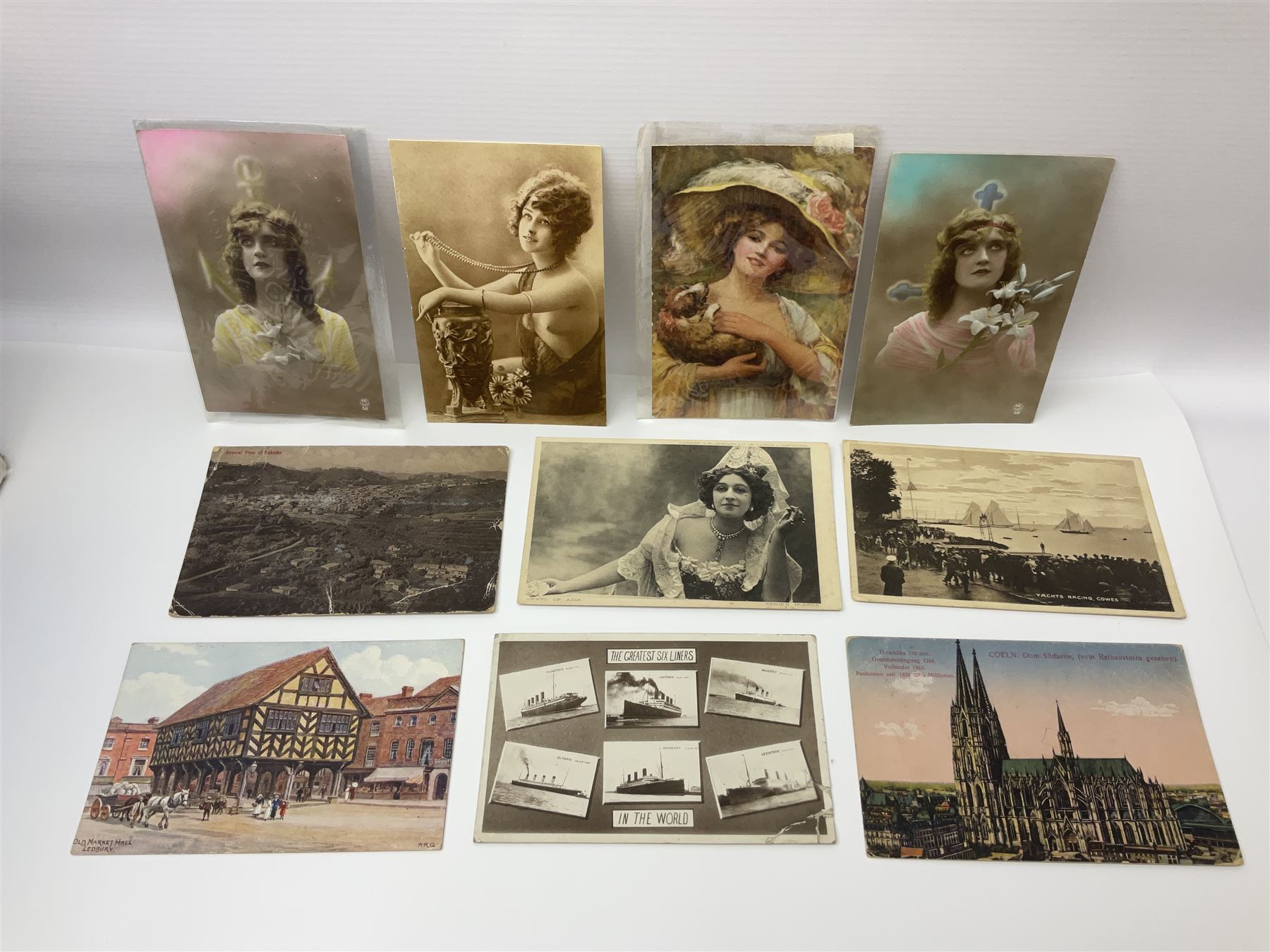 Studio Danielle Old English Sheepdog jewellery including two pairs of cufflinks, necklace and pin, together with similar belt buckle, hardstone tetradecahedron paperweight, postcards and an Imperial War Museum Falklands Conflict coin