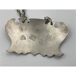 Five modern silver decanter labels, to include two sherry examples, embossed with scrolls and fruits, hallmarked W I Broadway & Co, Birmingham 1991 & 1997, a similar claret example, hallmarked S J Rose & Son, Birmingham 1973, and two plain shaped port and burgundy examples, hallmarked C Robathan & Son, Birmingham 1997 and A Haviland-Nye, London 1968