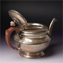 Silver circular teapot with stained wood handle and lift Birmingham 1933 Maker Adie Bros. Ltd