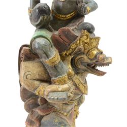 Hindu wooded sculpture depicting Vishnu riding on the shoulders of Garuda, H80cm
