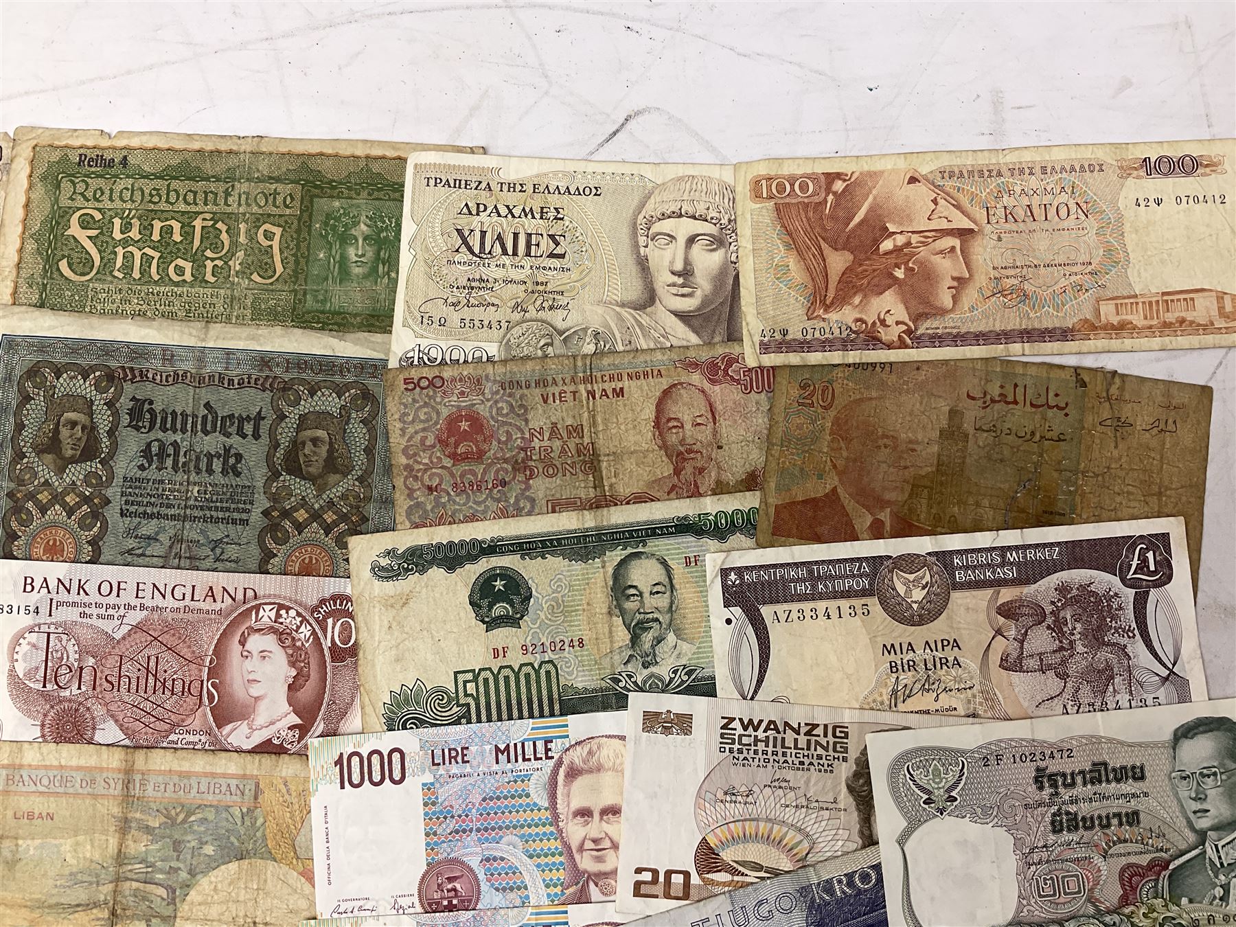 Great British and World banknotes, including Bank of England Page one pound 'EW57', Forde ten shillings 'C41N', various Belgian and Scottish notes etc