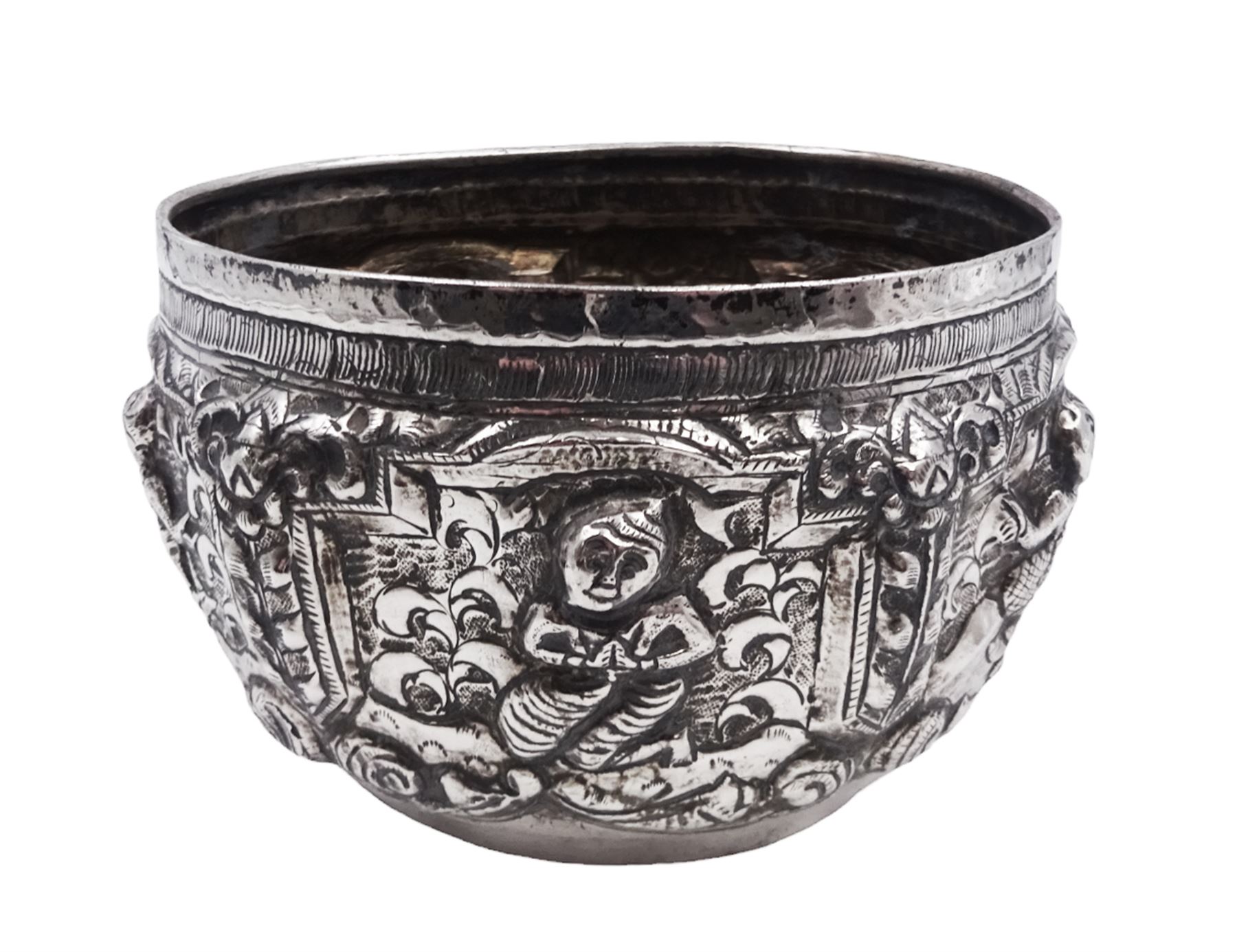 Burmese silver bowl, embossed with figural panels, C scrolls and floral decoration, H8.5cm