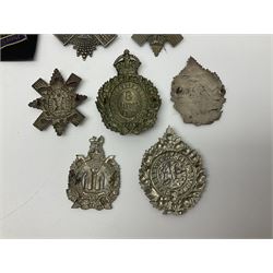 Seven Glengarry badges for Black Watch, 92nd Highlanders, 8th Scottish Volunteer Battalion The Kings Liverpool Regt., Argyll & Sutherland and Scottish Kings Own Borderers; together with quantity of uniform buttons and rank insignia; and cloth badges including RFC, RAF etc