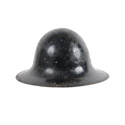 WWII German Third Reich K98 bayonet, with 19cm single edged fullered blade stamped to the ricasso Siegfried Waffen E Pack & Sohne Solingen, with chequered two piece grip in a steel scabbard, together with a steel helmet