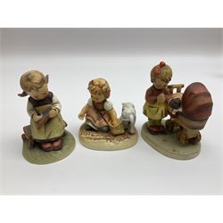 Twenty six Hummel figures by Goebel, to include Fire Fighter, Band Leader and Spring Sowing