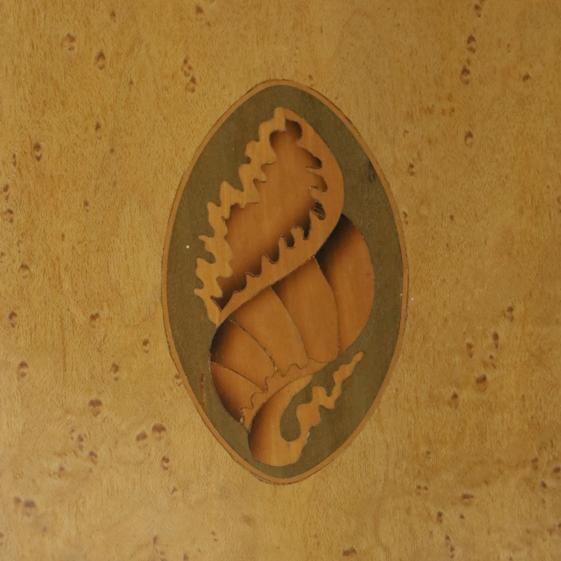 Edwardian inlaid birds-eye maple corner cabinet, urn finials above shell motif inlays, reeded column's hanging hooks