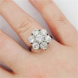 18ct white gold seven stone round brilliant cut diamond flower head cluster ring, London 1977, principal diamond approx 0.75, total diamond weight approx 3.15 carat