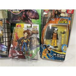 Fourteen carded action figures comprising Toy Story, X-Men Marvel Legends, Lord of the Rings, The Lost World Jurassic Park (2), The Secret Saturdays, Wallace & Gromit, Corgi Tom & Jerry (4), Flintstones, Lost in Space and Disney Infinity Cars; all in unopened blister packs; together with two boxed Robocop figures and carded James Bond car (17)