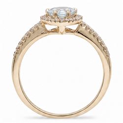 18ct gold aquamarine and diamond cluster ring, single pear cut aquamarine of approx 0.80 carat, surrounded by round brilliant cut diamonds and diamond set shoulders, London 2015