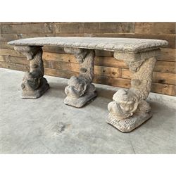 Cast stone four piece curved Dolphin bench, set with three dolphin pillars, curved rectangular slab top with detailed border