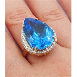  9ct gold pear shaped Swiss blue topaz, with diamond surround ring, hallmarked  