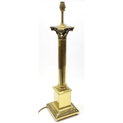 A brass Corinthian column table lamp, with shade, lamp including fittings H73cm. 