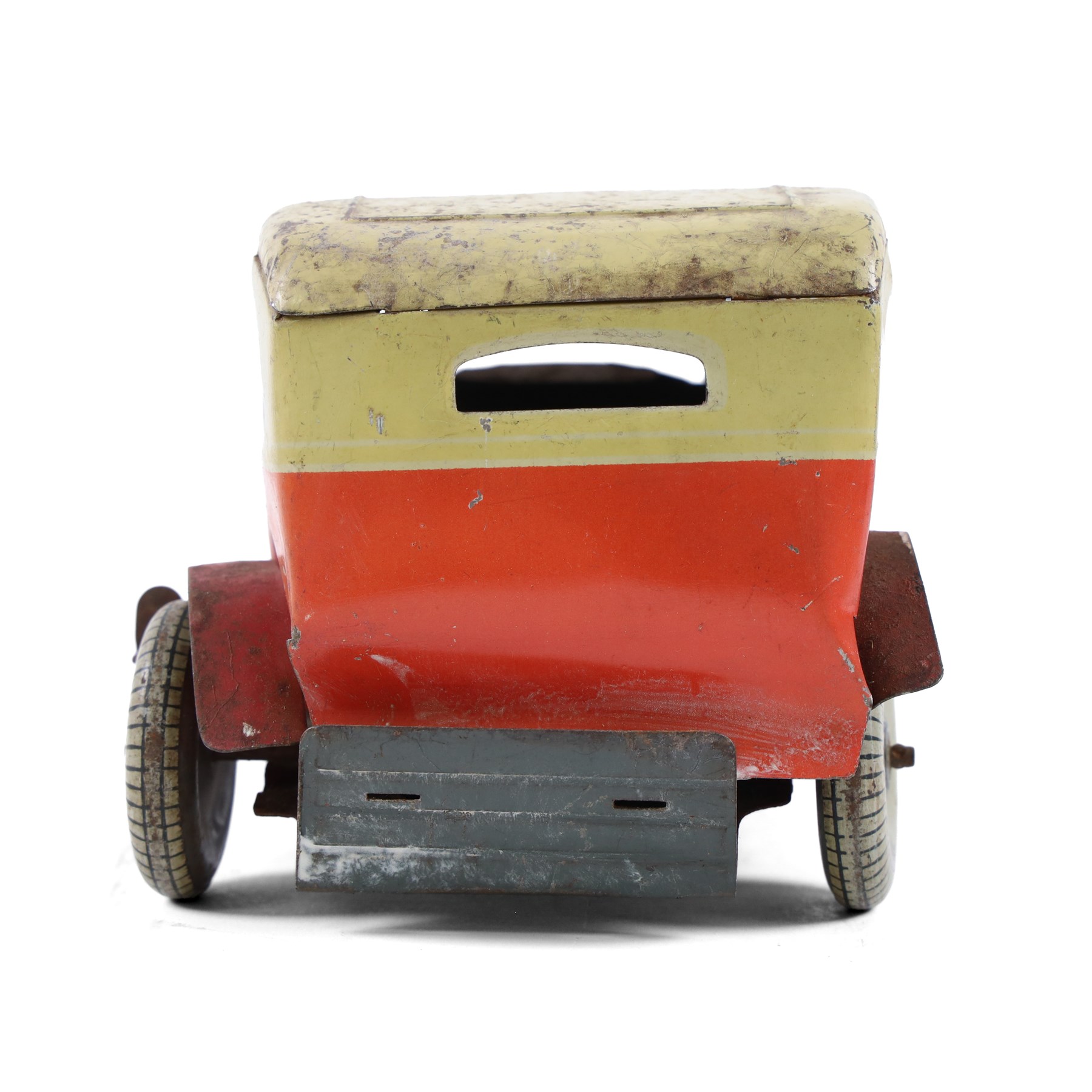 Mettoy tinplate clockwork Citroen saloon car, red orange body with cream roof and windows, with driver, Dunlop tyres and key, H9cm, L26cm