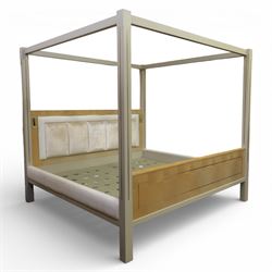 Contemporary maple and inlaid brass Emperor sized four poster bed, rectangular canopy frame with square section uprights, panelled headboard incorporating a padded upholstered inset, flanked by brass reading light fittings, low footboard with moulded panel detail, raised on square inlaid brass supports