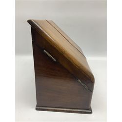 Small oak correspondence box, the front with twin sloped doors opening to reveal a compartmented interior fitted with pen tray, inkwell recesses and letter rack, above a lower drawer, H26cm D17cm