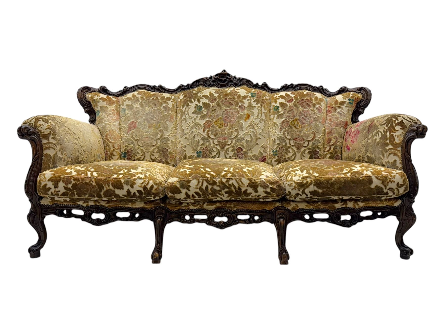 Victorian design stained wood three seater settee, top rail carved and scrolled, padded back and arms, scrolled cabriole feet 