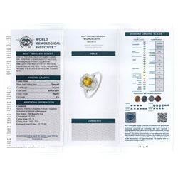 Platinum emerald cut yellow sapphire, baguette and round brilliant cut diamond cluster ring, stamped Plat, sapphire 1.30 carat, total diamond weight 0.55 carat, with World Gemological Institute Report