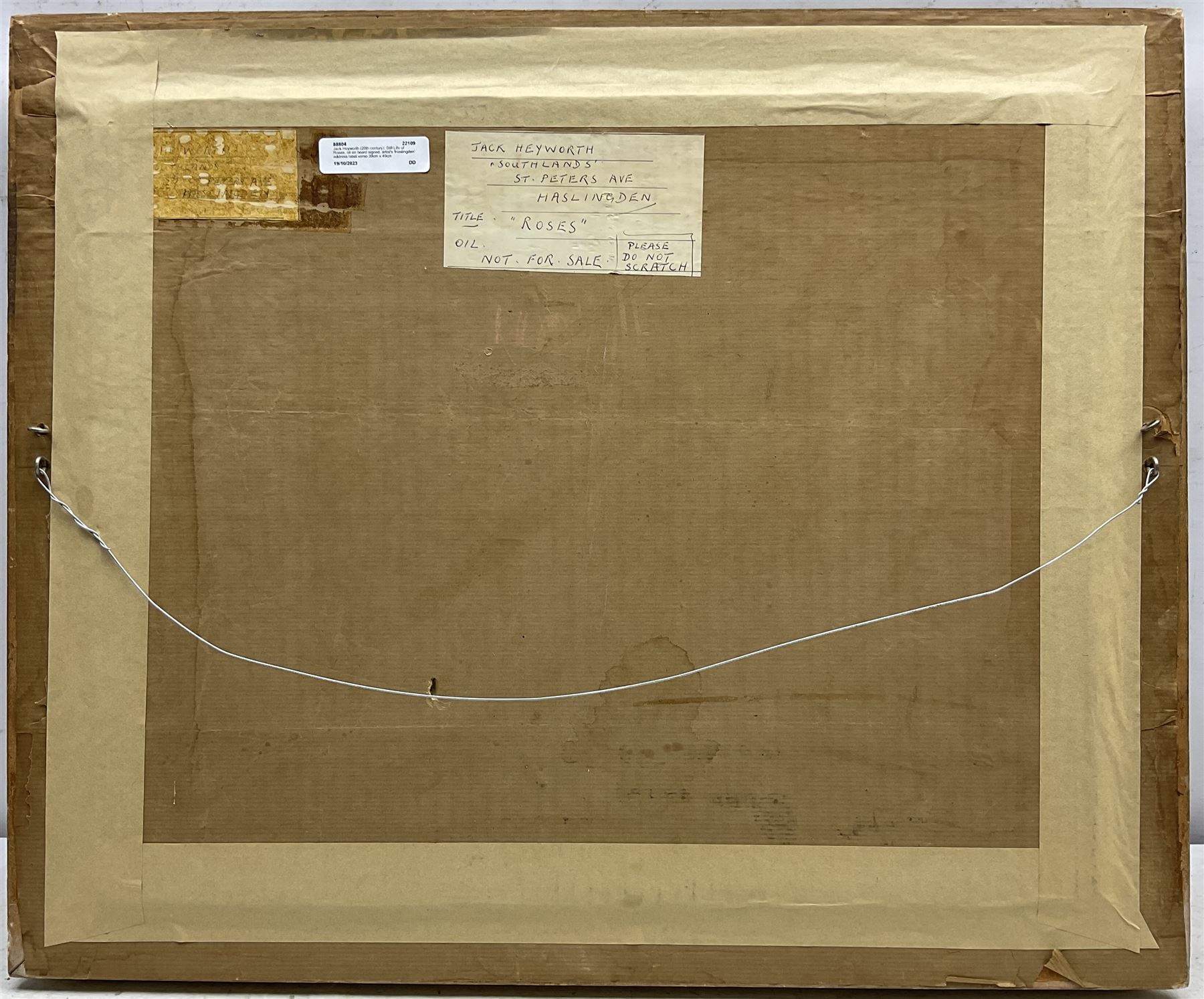 Jack Heyworth (20th century): Still Life of Roses, oil on board signed, artist's 'Haslingden' address label verso 39cm x 49cm