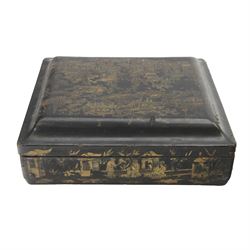 19th century Chinese export black lacquered games box, of rectangular form decorated to the exterior with figures, pagodas and bridges in a riverside landscape in red and gilt, the lift off cover opening to reveal a compartmented interior with four removable covered boxes decorated with conforming figural scenes, and eight trays decorated with stylised suits, H10cm W30cm D27cm