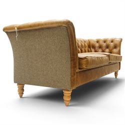 Contemporary Chesterfield design 'Caesar' three seat sofa, traditional shape with out-swept arms, upholstered in tan leather with loose seat cushions, the back, sides and buttons upholstered in chevron stitched Harris Tweed, on turned feet