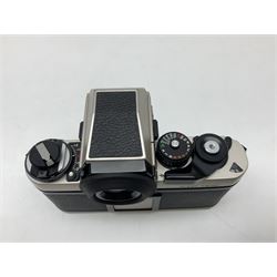 Nikon F3T camera body, in champagne/ titanium colourway, serial no. T8215031, with 'Nikon Nikkor 50mm 1:1.4' lens, Nikon MD4 motor drive, serial no. 156592 and Nikon MK-1 Firing range converter, all with original boxes 