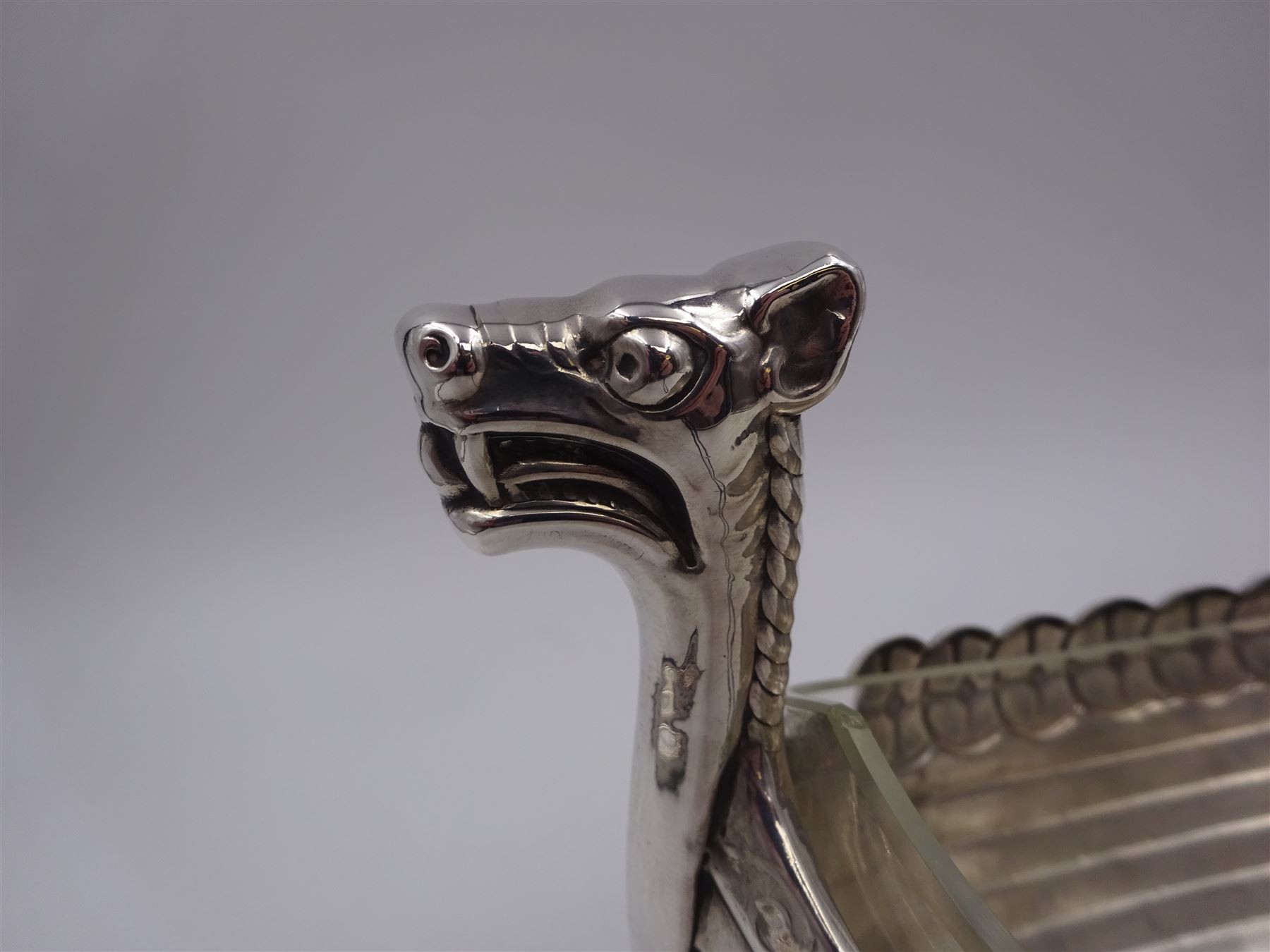 Silver plated novelty sugar bowl, in the form of a viking longship, with clear glass liner, stamped Alpacca to base, H15.5cm