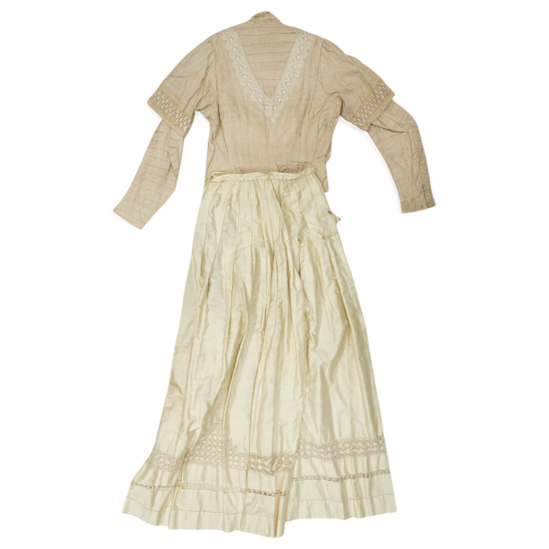 Two Edwardian childrens or ladies bodices and skirts, in cream with panels of contrasting  lace detailing (2)