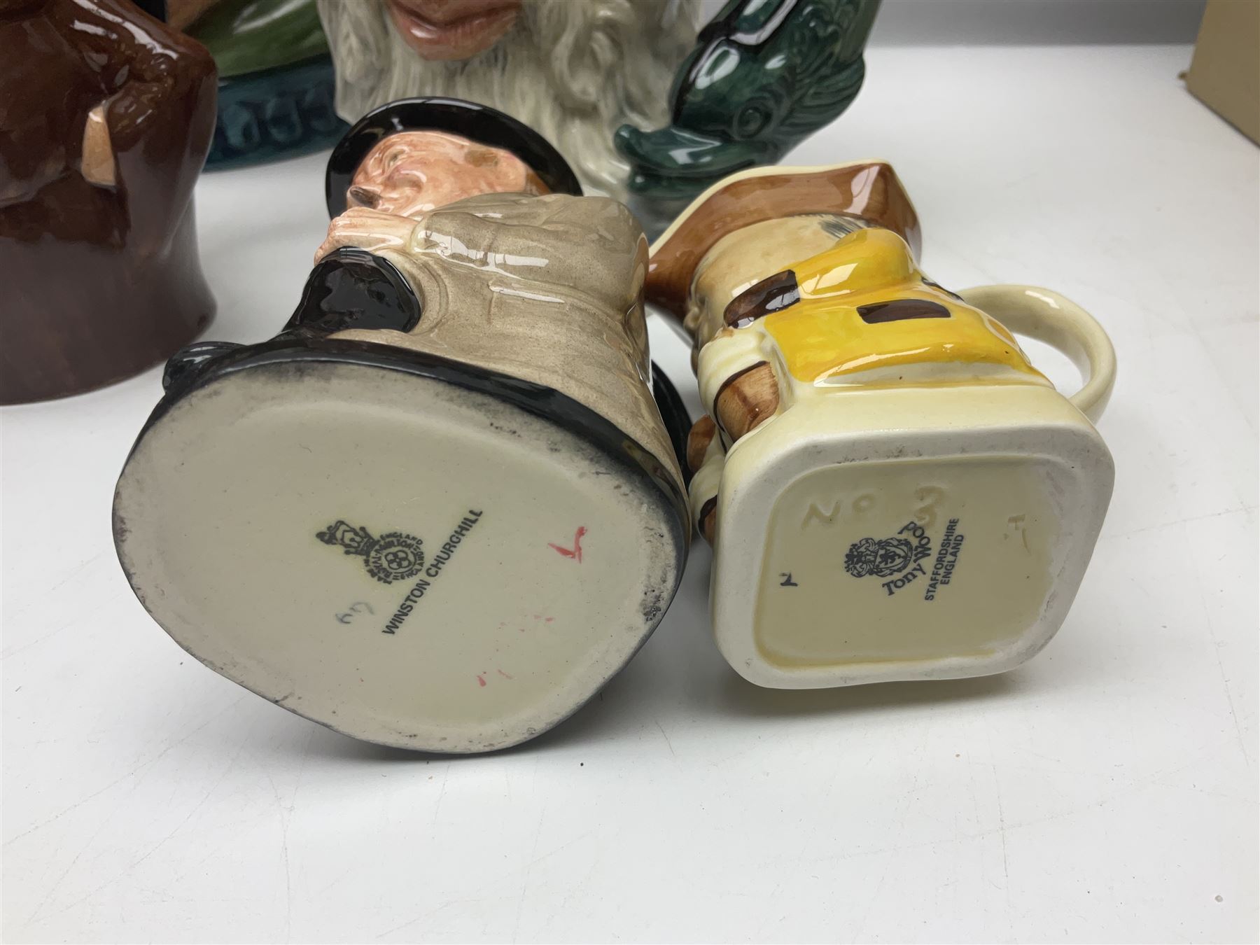 Collection of toby jugs and character jugs, to include Royal Doulton Winston Churchill and Neptune, together with Staffordshire Character Jugs examples  
