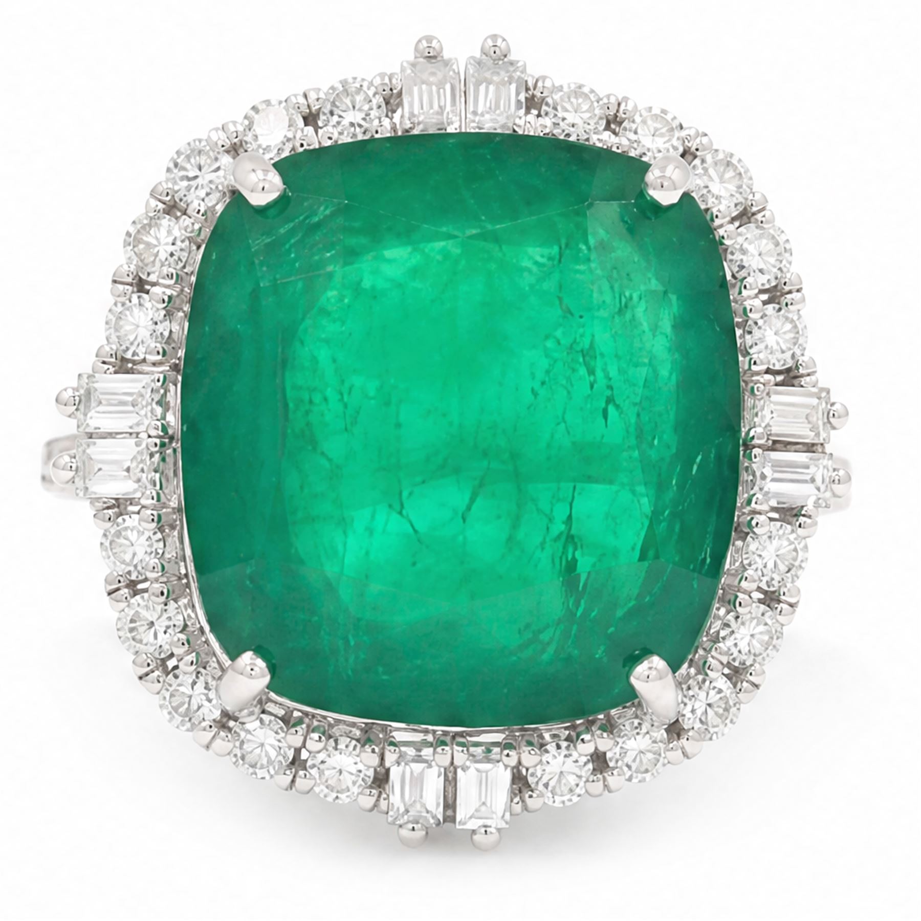 18ct white gold emerald and diamond cluster ring, single cushion cut emerald of approx 13.20 carat, surrounded by round brilliant and baguette cut diamonds and diamond set shoulders, stamped 18K, total diamond weight approx 1.00 carat