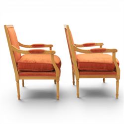Pair of mid-20th century beechwood fauteuil armchairs, upholstered backrest and seat in terracotta velvet fabric, padded armrests with scroll detail, on tapered fluted supports with carved floral rosette blocks (very modern and not a desirable timber)