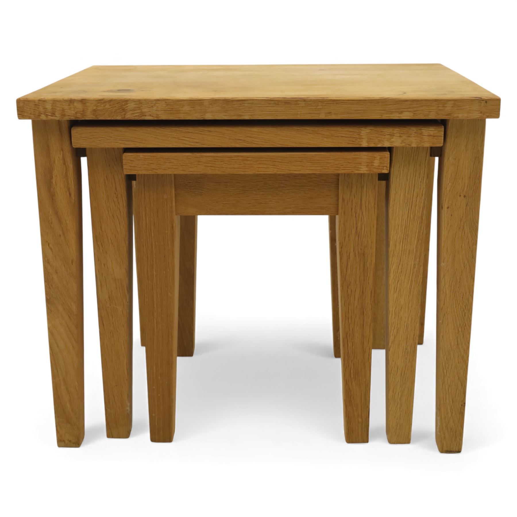 Modern solid oak nest of three tables, each with straight-edged rectangular top and square legs