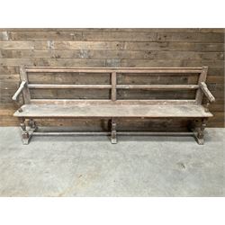 Victorian pitch pine bench pew, turned arms and legs, rail back with plank seat, 249cm
