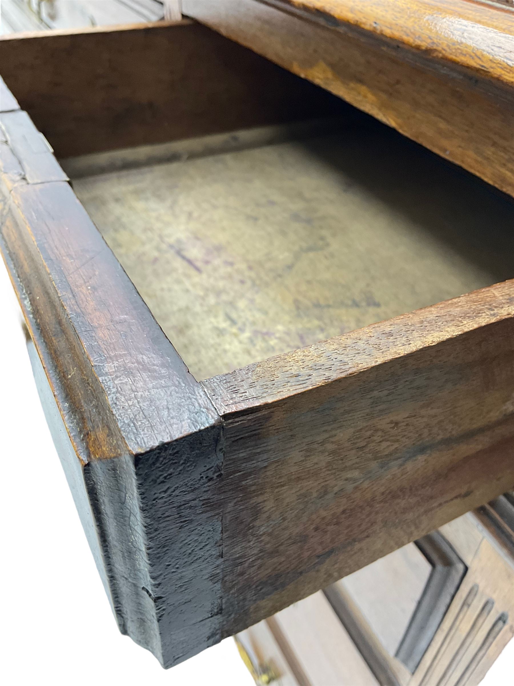 Early 20th century mahogany twin pedestal desk, fitted with nine drawers, on ball and claw carved cabriole feet
