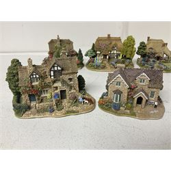 Fifteen Lilliput Lane models, including The Nineteenth Hole, Cowslip Cottage, The Lion Mongers, Going For a Song and Old Crofty, Gossip Gate and Beehive Cottage, all with deeds and original boxes (15)