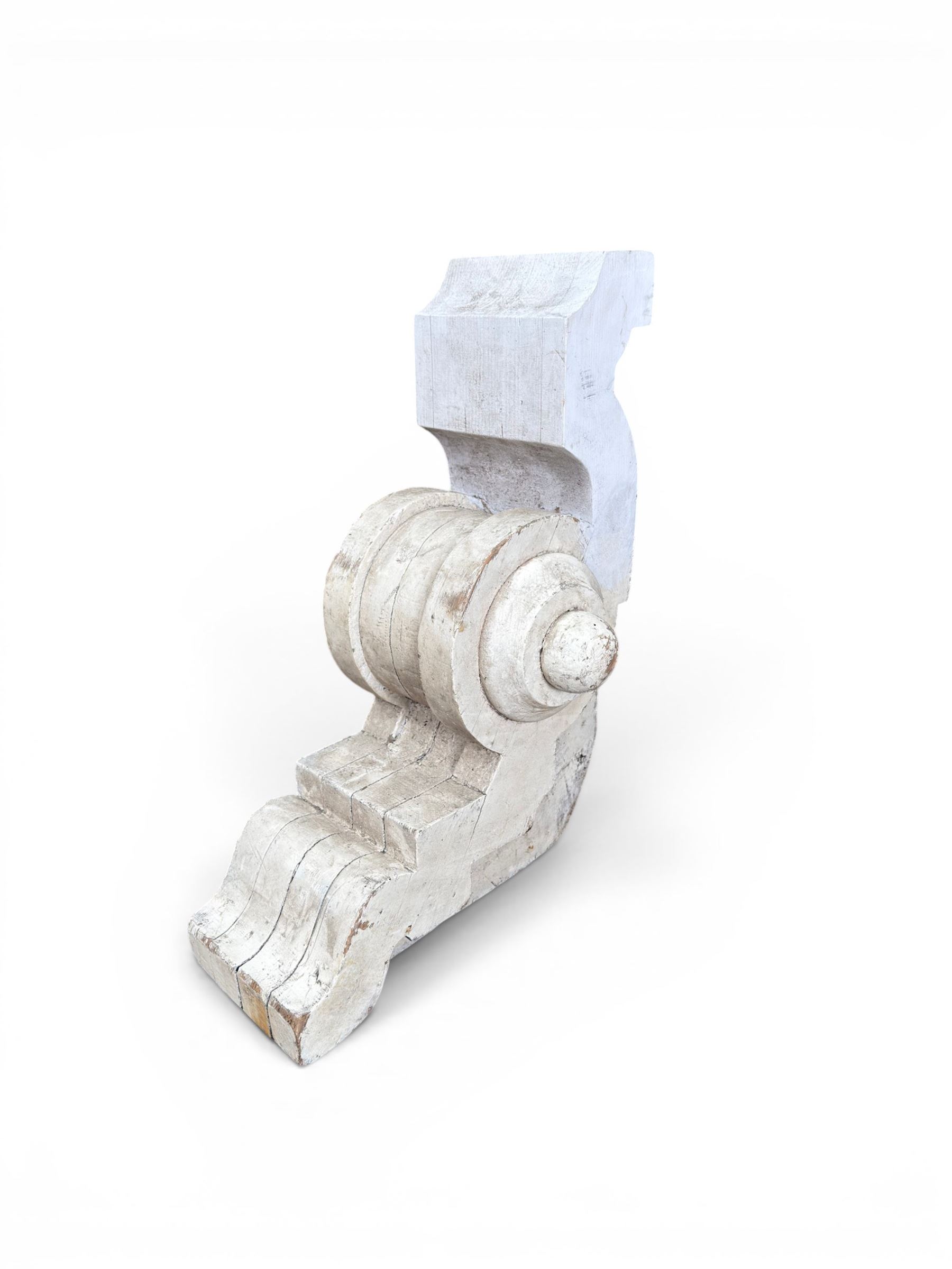 Pair of 19th century stripped pine columns  with carved capitols; an a pair of painted scroll architectural capitols (4)